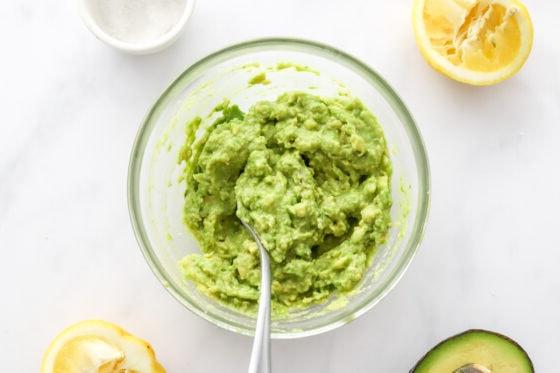 Mashed avocado in a bowl.