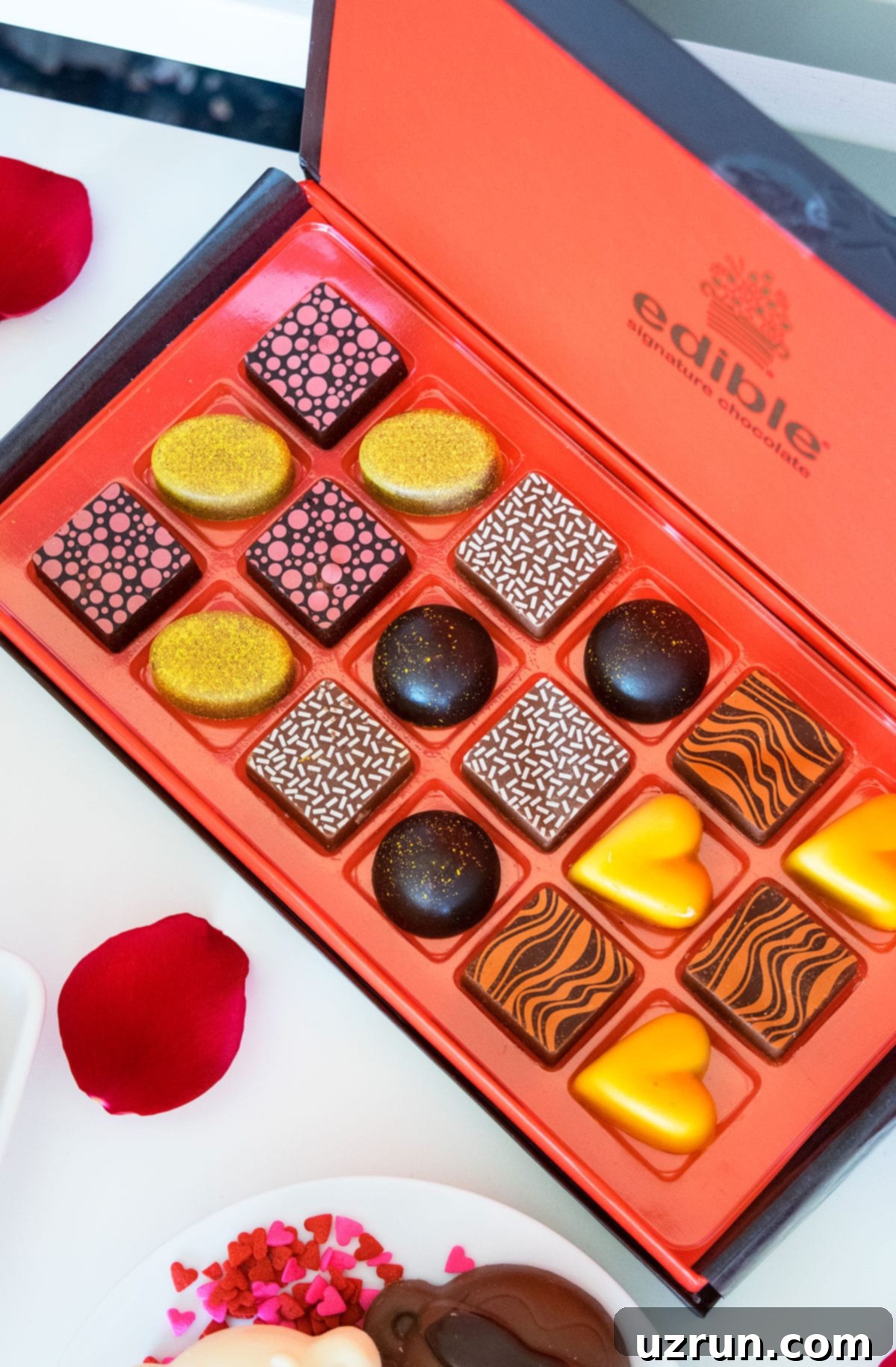 Delicious Food and Romantic Decor for Your Valentine's Day Party 9 Box of Fancy Candies and Chocolates on White Table.