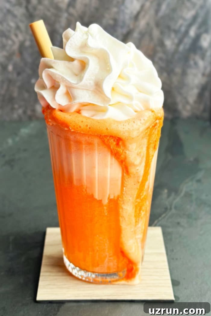 Easy Ice Cream Float With Fanta or Crush and Topped With Whipped Cream in Glass Cup