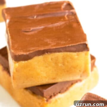 Chewy No-Bake Peanut Butter Oatmeal Bars 7 Stack of Easy No Bake Peanut Butter Bars on White Background.