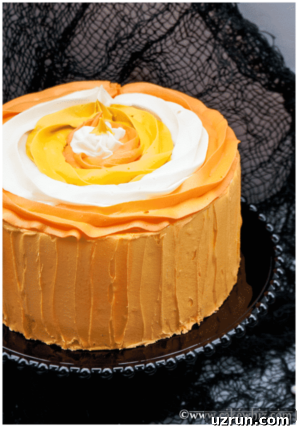 Simple Frosted Candy Corn Cake 3 Easy Candy Corn Cake on Black Cake Stand
