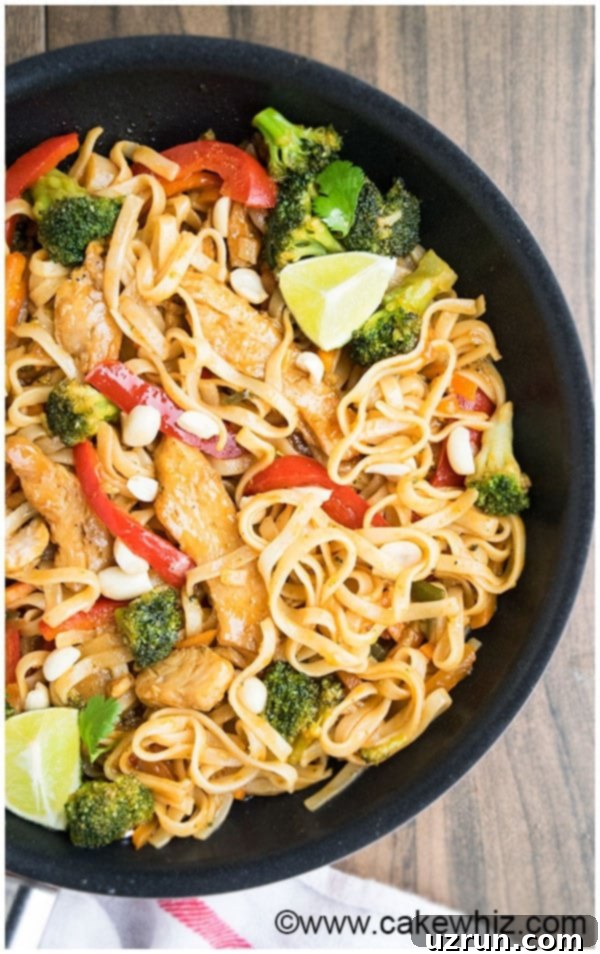 Easy Chicken Pad Thai Recipe, a simple weeknight meal with spicy Thai flavors and peanuts.