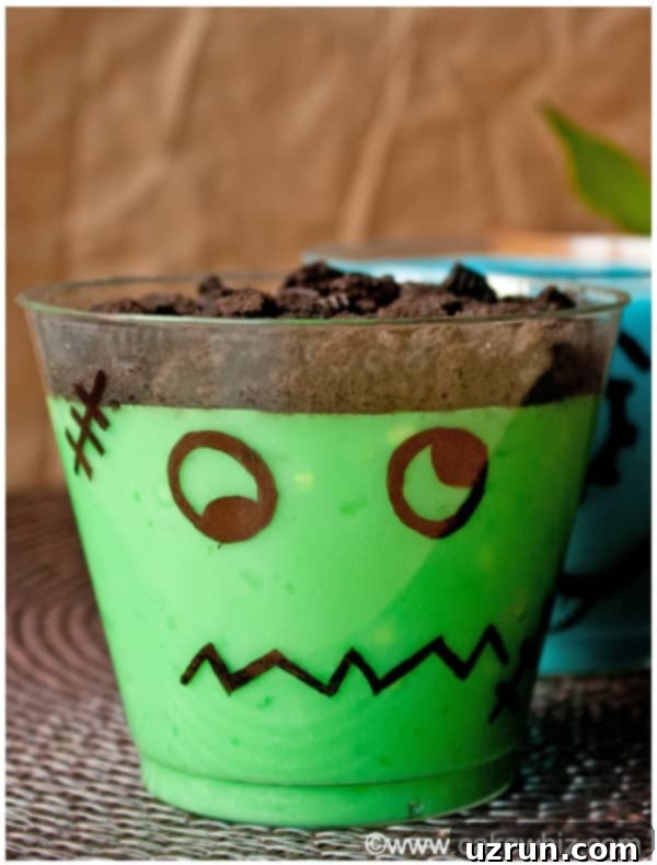 Fun Halloween Pudding Cups 3 Frankenstein Pudding Cups on Brown Background