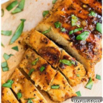 Perfect Grilled Chicken Marinade 5 Easy Sliced Grilled Chicken Breast on Wood Board.