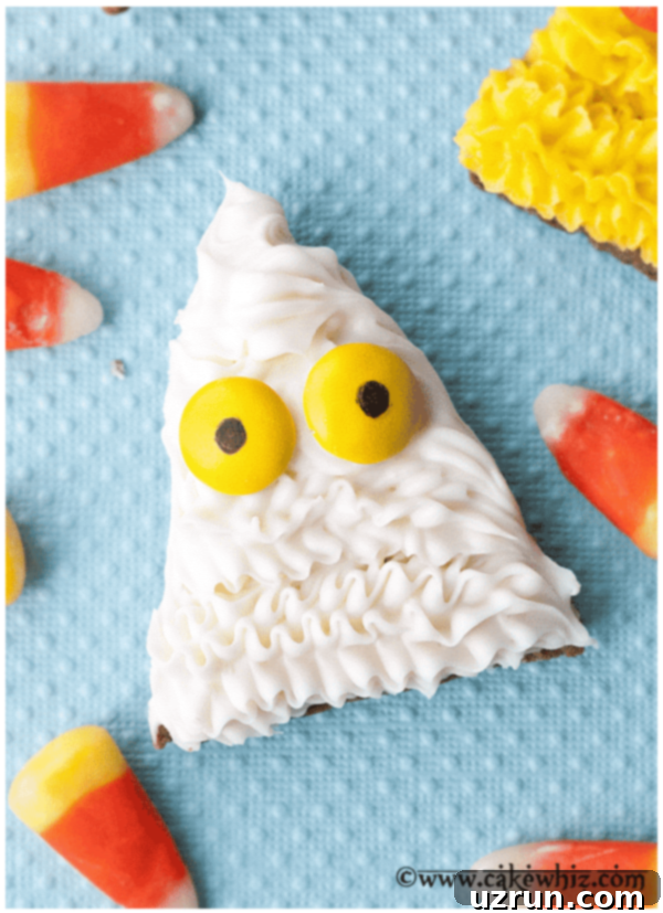 Easy Candy Corn Monster Cookies 3 Halloween Sugar Cookies With Buttercream Icing on Turquoise Background