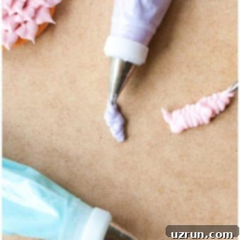 How to Make Perfect Royal Icing 8 Piping Bags of Easy Royal Icing For Cookie Decorating on Light Brown Background.