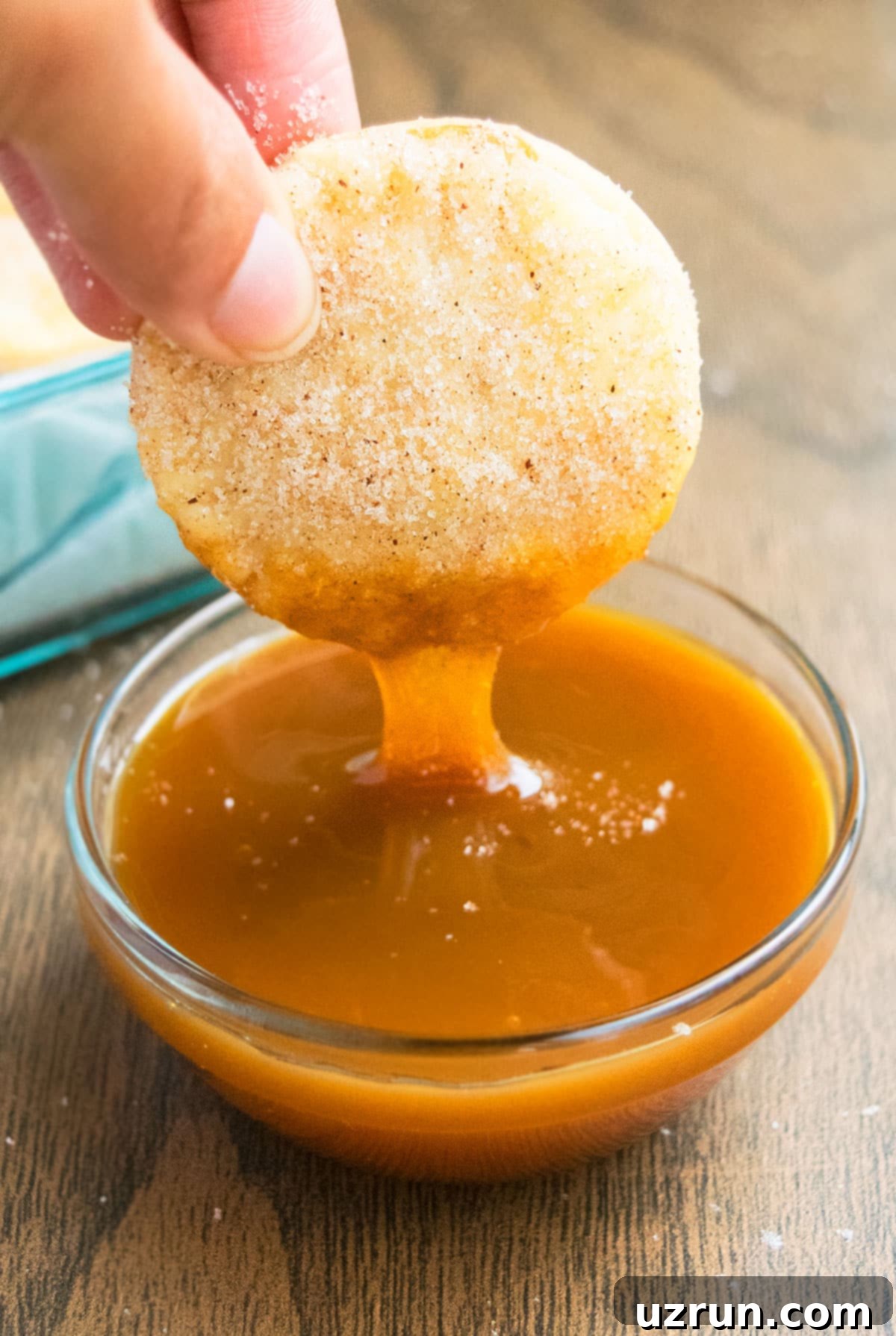 Flaky Pie Crust Churro Cookies 6 Cinnamon Spiced Pie Crust Cookies Being Dipped in a Bowl of Caramel Sauce