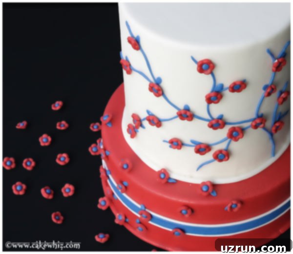 Easy Tiered 4th of July Cake 3 Homemade Fourth of July Cake on Black Background- Overhead Shot showing intricate fondant details
