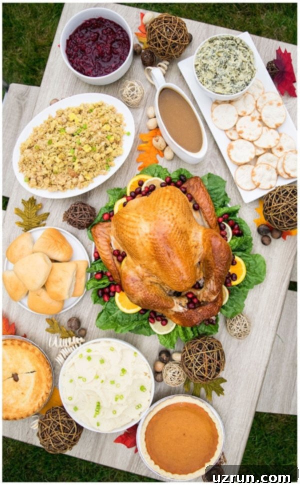 The Ultimate Thanksgiving Hosting Guide 5 A perfectly roasted and garnished Thanksgiving turkey, presented on a platter with fresh cranberries, orange, and lemon slices, ready for carving.