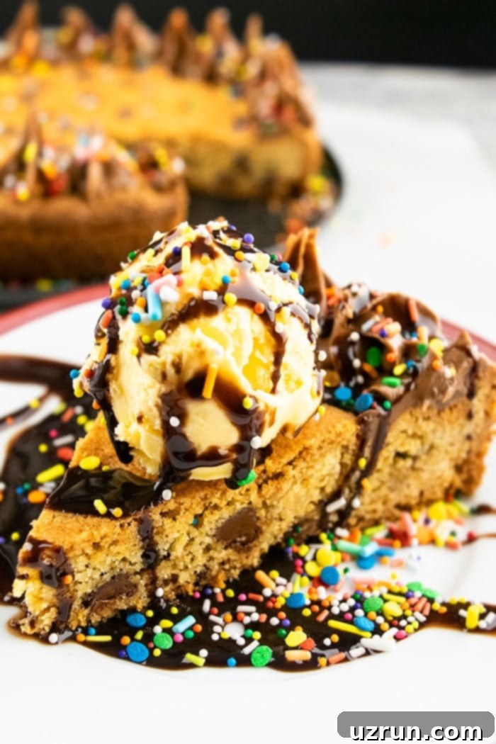 Cake Mix Chocolate Chip Cookie Cake 3 Cookie Cake Slice with Scoop of Ice Cream, Sprinkles and Chocolate Fudge Sauce