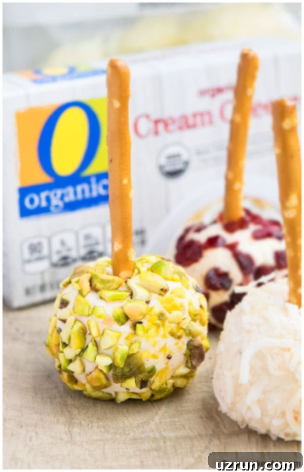 Variety of Mini Cheese Balls on Wood Background.