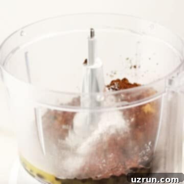 Delightfully Simple Gluten Free Black Bean Brownies 4 Black beans, honey, butter, brown sugar, cocoa powder, baking powder, vanilla extract added to a blender.