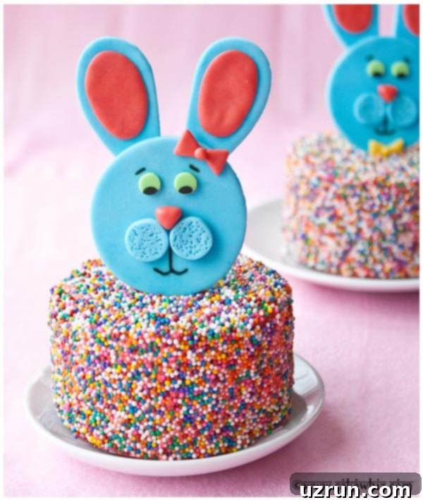 Easy Fondant Bunny Cake Topper on Sprinkle Cake Placed on White Plate with Pink Background