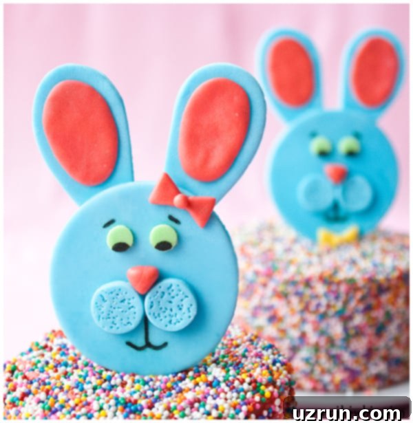 Whimsical Easter Cake Bunny 3 Closeup Shot of Blue Fondant Bunny Topper With Pink Background