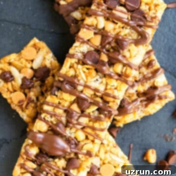 Effortless No Bake Granola Bars 11 Easy No Bake Chewy Homemade Granola Bars With Peanut Butter and Chocolate Chips on Dark Gray Background.