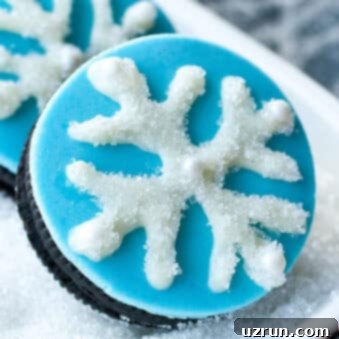 Snowflake Oreos 5 Easy Snowflake Cookies (Snowflake Oreos) on White Dish