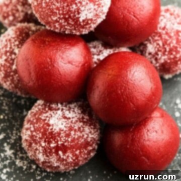 Cake Mix Red Velvet Truffles 5 Stack of Easy Red Velvet Truffles With Cake Mix on Rustic Gray Background.