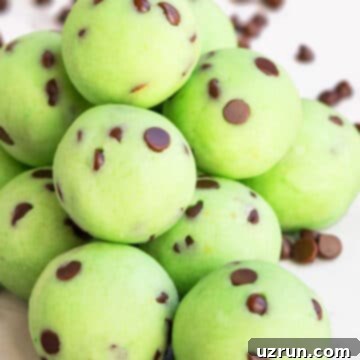 Easy Chocolate Mint Truffles 6 Stack of Easy Chocolate Mint Truffles With Chocolate Chips on White Background.