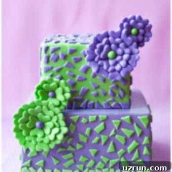 Crafting Beautiful Fondant Flowers 5 Square Tiered Cake With Edible Easy Fondant Flowers on Pink Background