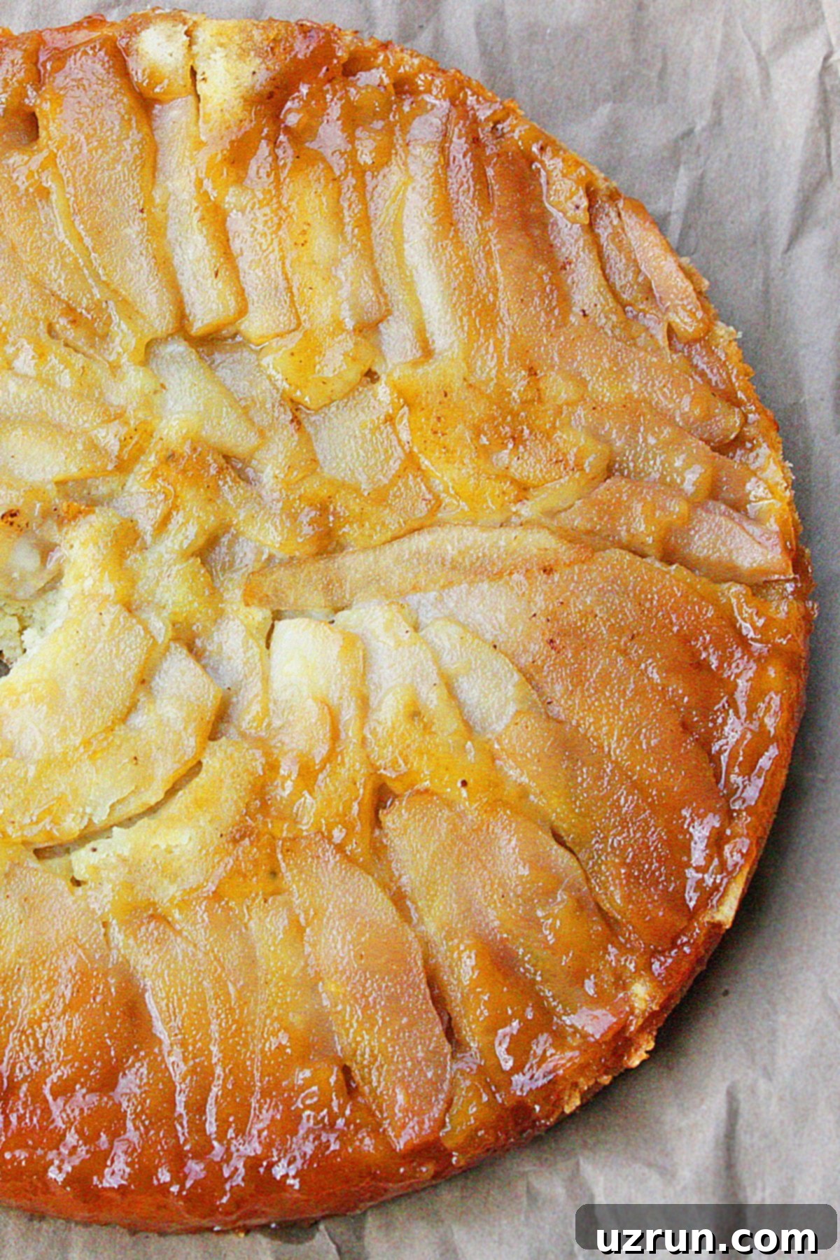 Golden Caramelized Pear Upside Down Cake 2 Easy Pear Cake on Rustic Brown Background- Overhead Shot