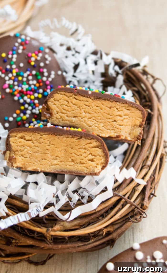 Easy 4-Ingredient Peanut Butter Eggs 3 Sliced Homemade Reese's Chocolate Eggs for Easter- Closeup Shot.
