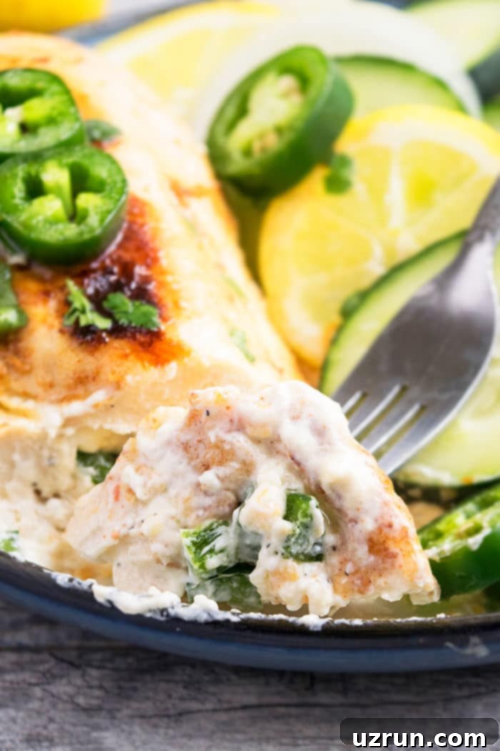 Jalapeno Popper Chicken 4 Fork Full of Spicy Cheesy Chicken.