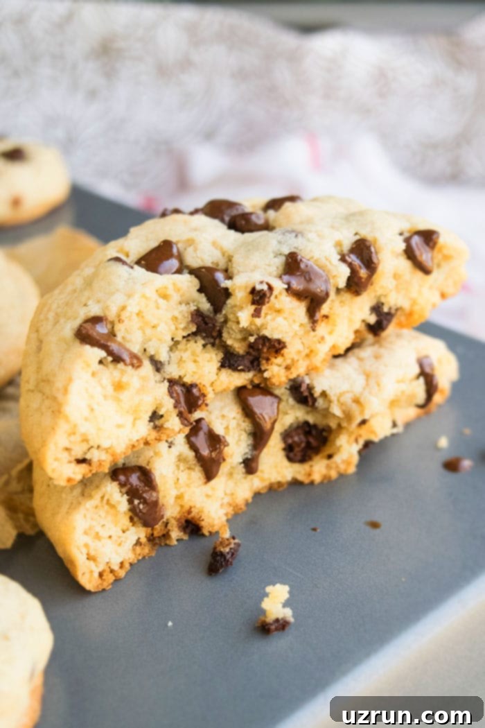 Best Jumbo Soft and Chewy Chocolate Chip Cookies 3 Cookies Cut in Half Stacked on Top Of Each Other.