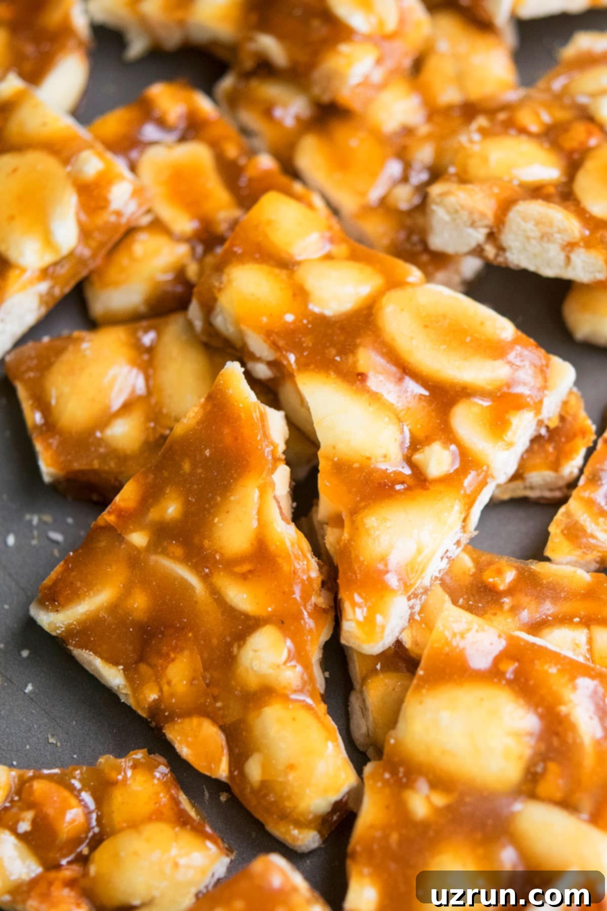 Easy Peanut Brittle Homemade in Microwave on Metal Tray.