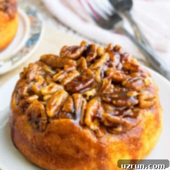 Pecan Caramel Sticky Buns 5 Easy Upside Down Caramel Pecan Sticky Buns on White Dish.