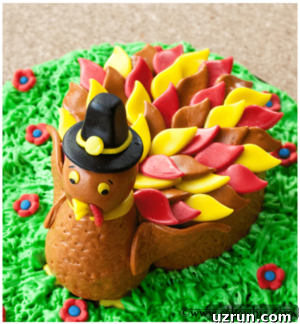 Thanksgiving Turkey Cake 5 Overhead Shot of Decorated Thanksgiving Cake, displaying the full turkey design on a vibrant green base.
