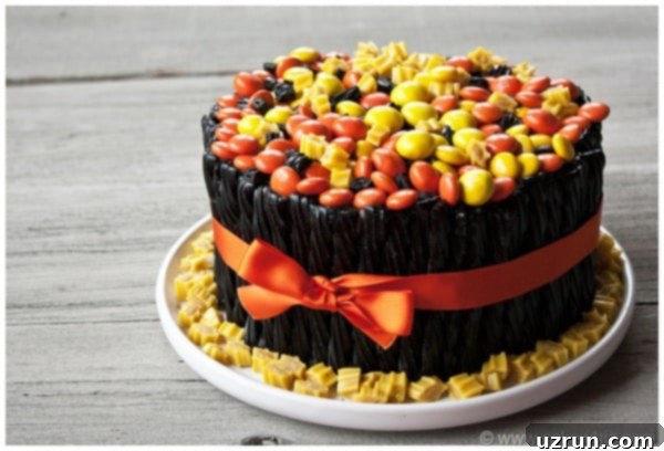 halloween twizzler cake 15 Homemade Halloween Twizzler Cake on White Dish With Rustic Gray Background