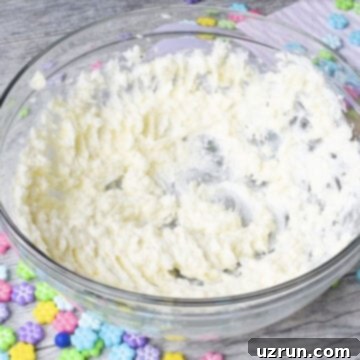 Easy Mango Buttercream Frosting 5 Butter and shortening creamed together in glass bowl.
