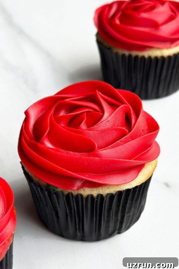 Mastering Cupcake Decoration 15 Piped Rose Cupcake With Buttercream Icing and Tip 1M on White Background