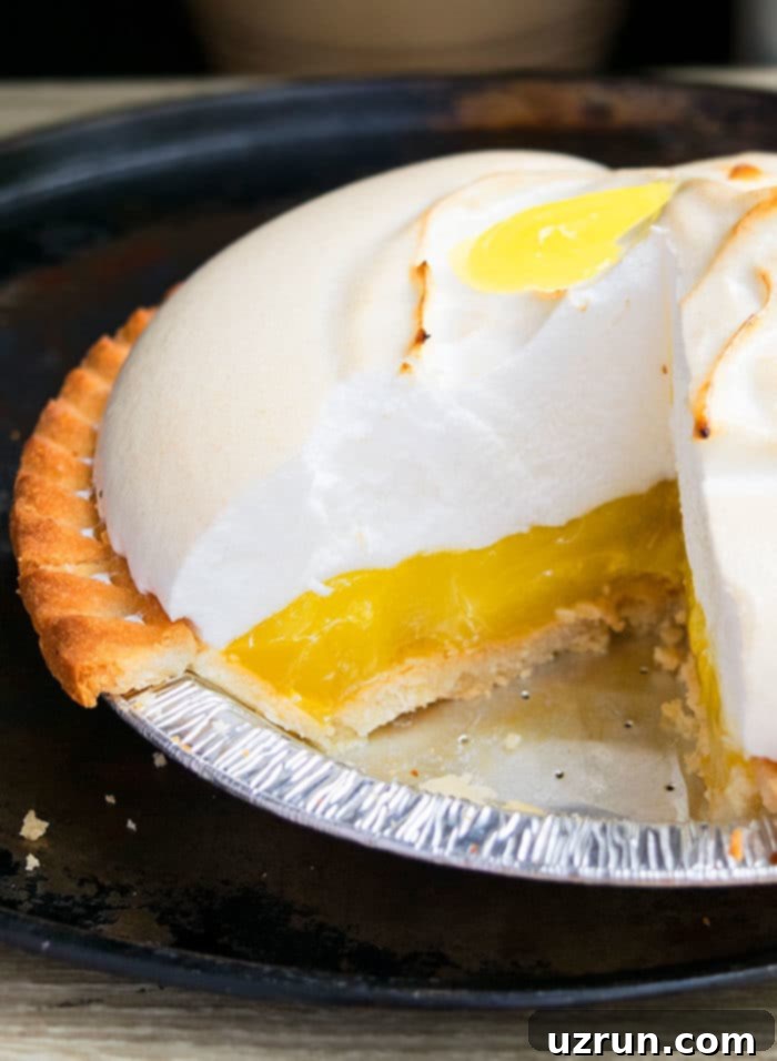 Best Lemon Meringue Pie With One Slice Removed. 