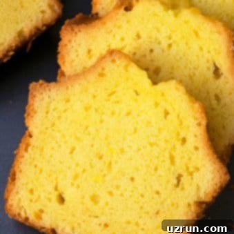 Lemon Pound Cake from a Mix 6 Slices of Lemon Pound Cake With Cake Mix on Gray Tray.