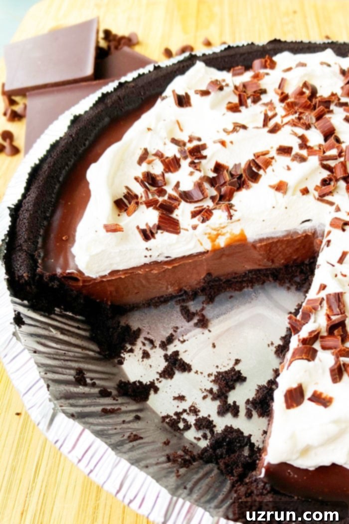 Easy No-Bake Chocolate Cream Pie 3 No Bake Chocolate Pudding Pie With One Slice Removed