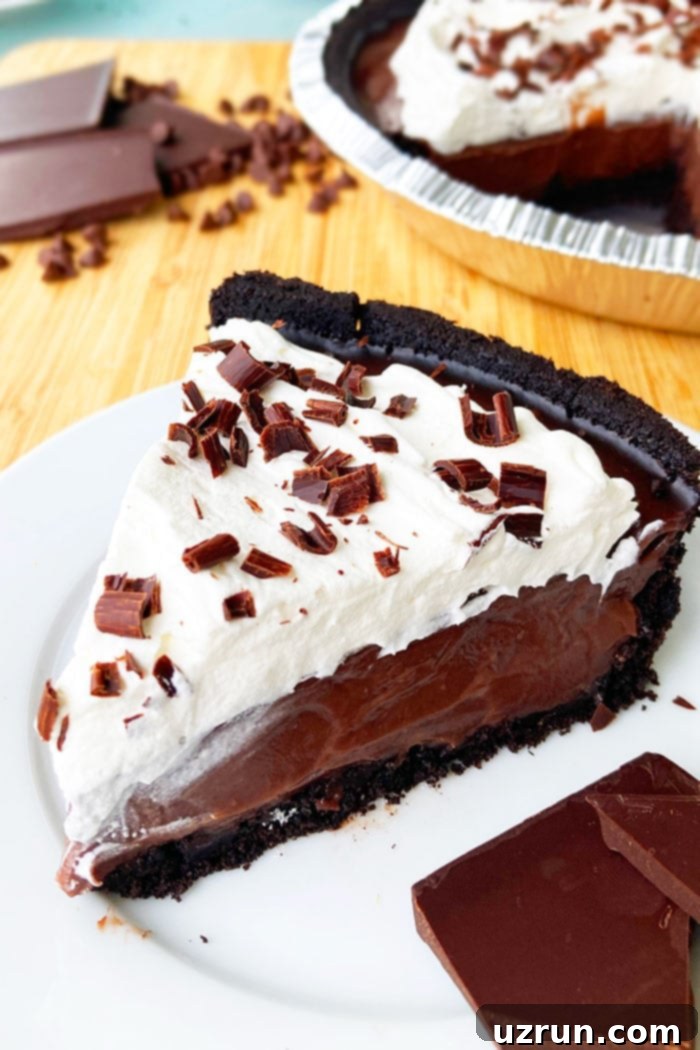 Easy No-Bake Chocolate Cream Pie 4 Slice of Homemade Chocolate Pie With Pudding in White Plate
