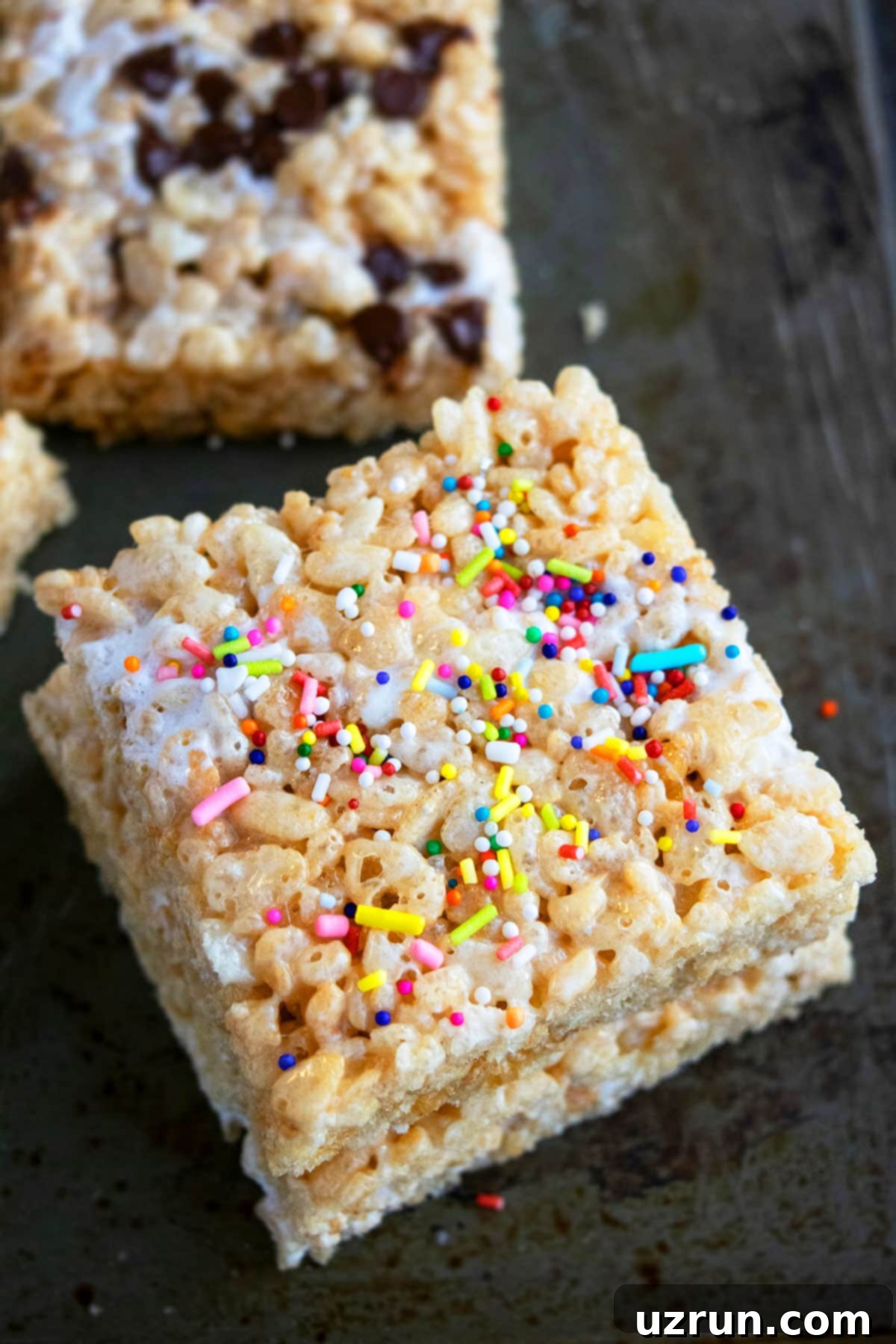 The Ultimate Guide to Perfect Rice Krispie Treats 3 Best Marshmallow Rice Krispie Bars With Sprinkles on Gray Background.