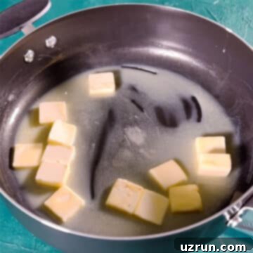 The Ultimate Guide to Perfect Rice Krispie Treats 4 Nonstick Pot With Cubes of Butter Melting.