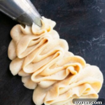 Easy 4-Ingredient Maple Frosting 5 Easy Maple Frosting Piped on Black Background