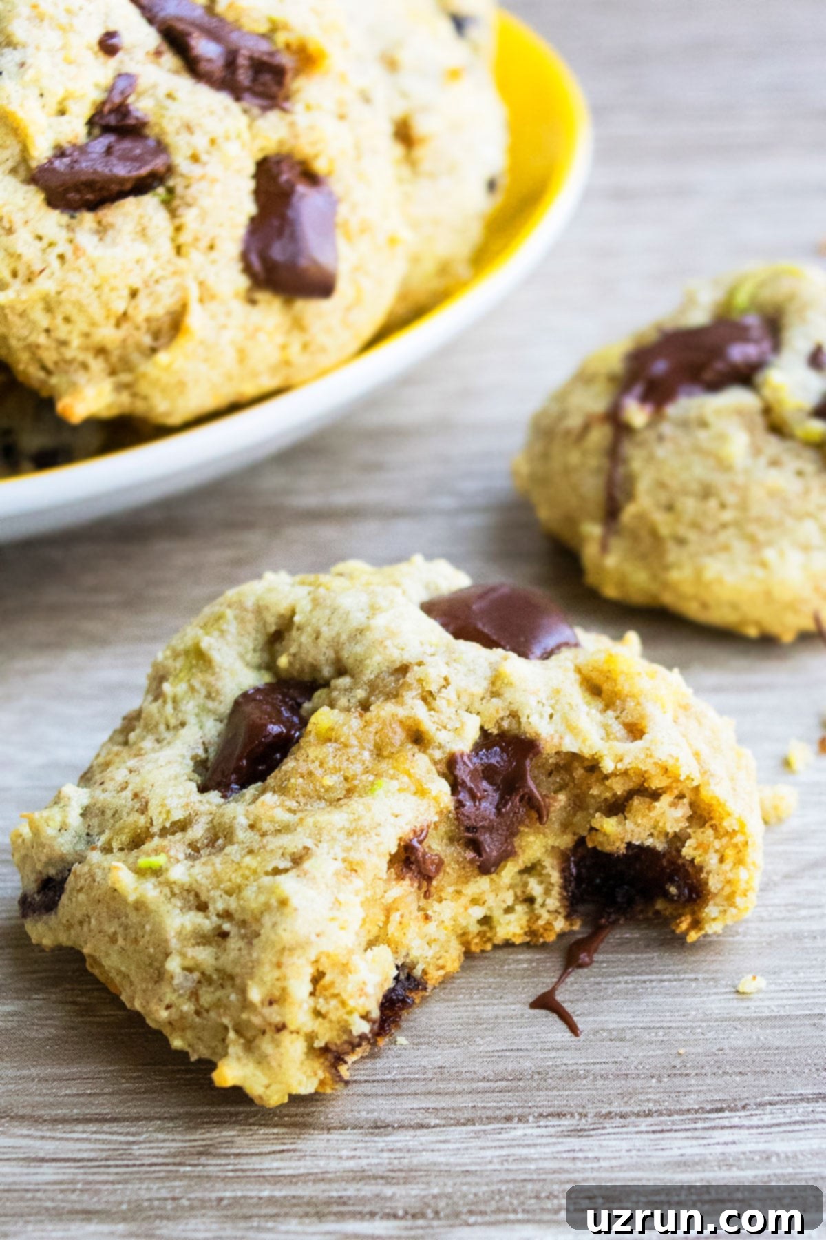 Delicious Avocado Chocolate Chip Cookies 4 Close up of a single Easy Avocado Cookie with chocolate chips, showing its fluffy, moist texture.