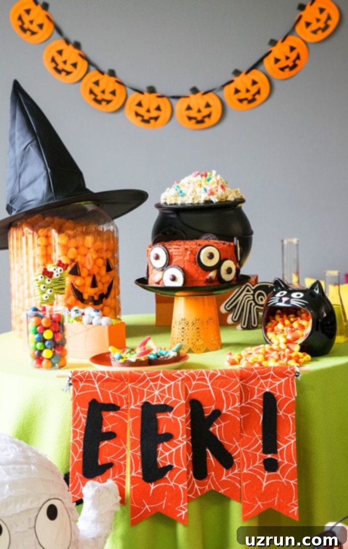 Easy Kids Halloween Party Dessert Table With Owl Cake in Center