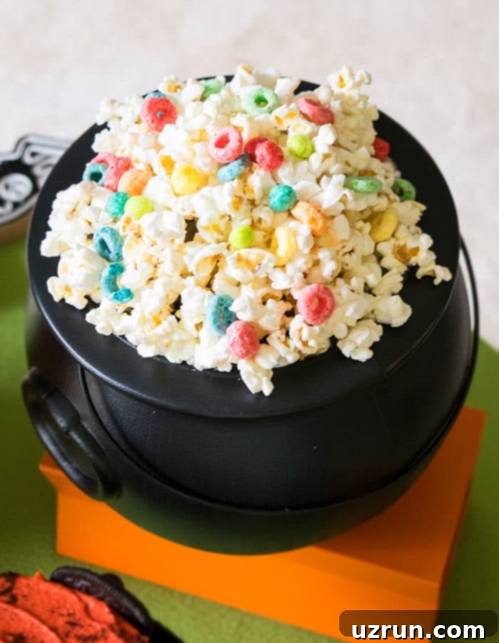 Easy Owl Cake for Kids Halloween Party 11 Popcorn Mix in Black Cauldron