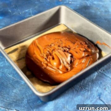 Easy Brookies with Brownie Mix 8 Brownie batter poured in lined baking pan.