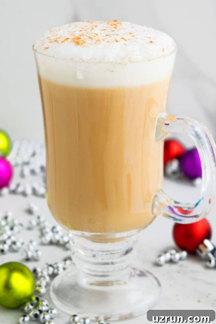 Homemade Eggnog Latte Recipe with whipped cream and cinnamon dusting