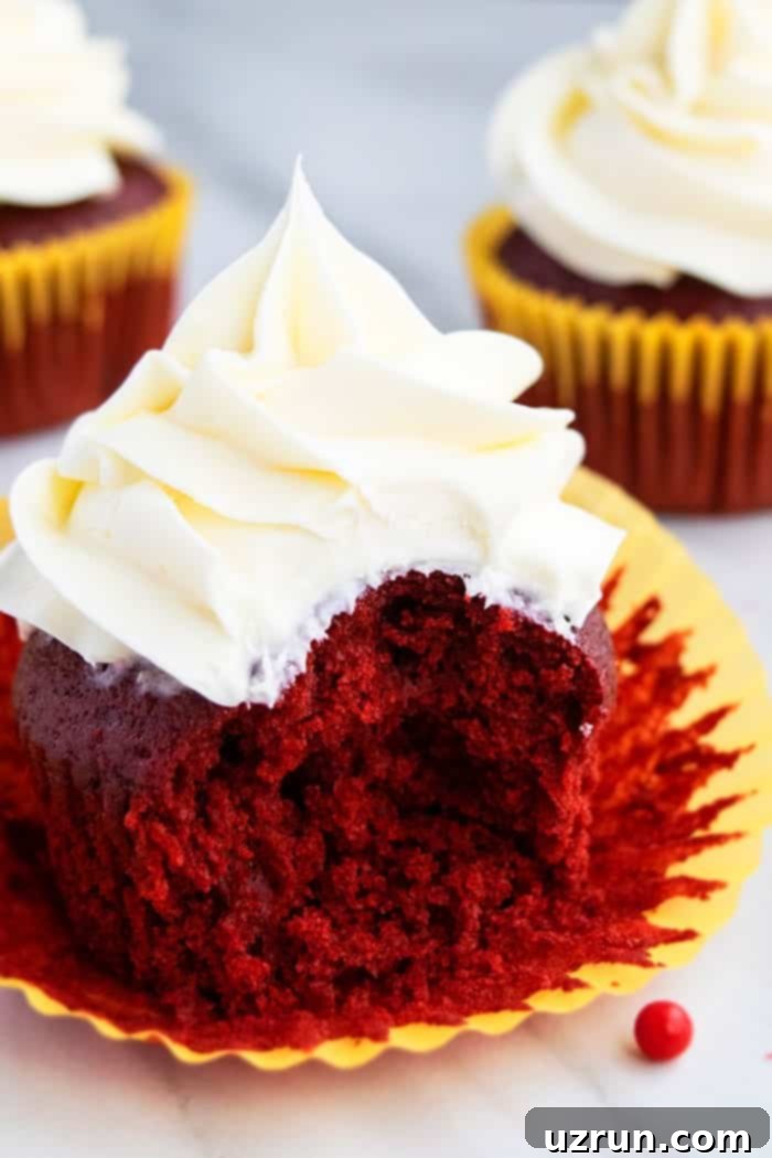 Ultimate Red Velvet Cupcakes with Cream Cheese Frosting 3 Partially Eaten Best Red Velvet Cupcake With Cream Cheese Frosting