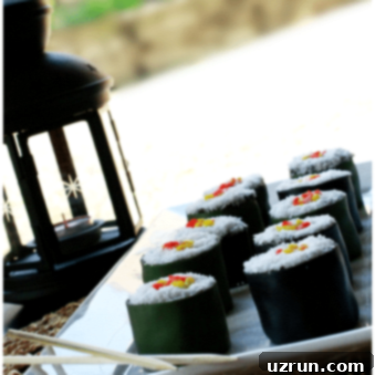Effortless Birthday Sushi Cake 5 Easy Sushi Cake For Birthdays on White Tray.