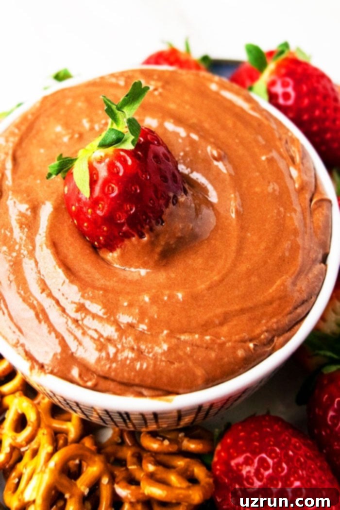Whipped Chocolate Fruit Dip 4 Homemade Chocolate Dip with Chocolate Chips and Cool Whip in White Bowl