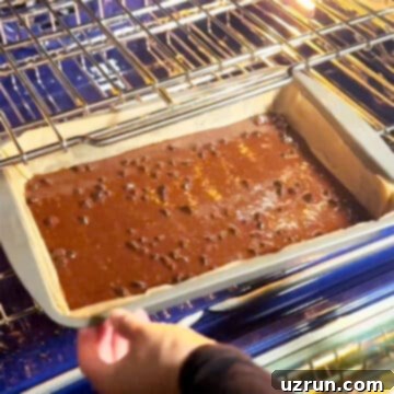 Box Mix Caramel Brownies 6 Brownie being baked in oven.