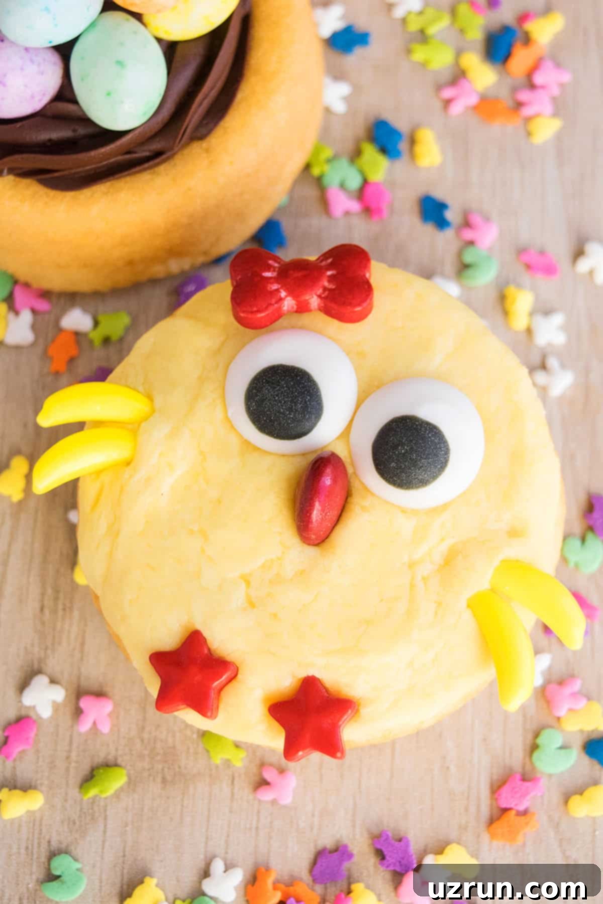 Creative Easter Cake Ideas 6 Homemade Easter Chick Cake on Rustic Wood Background, perfectly decorated with candy eyes, feet, and wings.